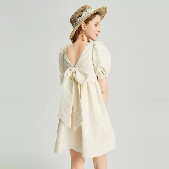 Elegant Reversible Puff Sleeve Bow Dress - Cream Textured Satin - Picture 1 of 7